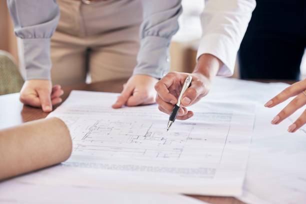 établir un dossier de permis de construire avec un professionnel